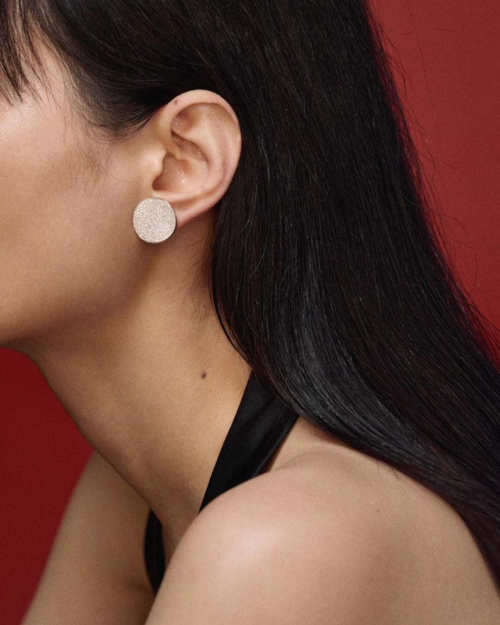 Diamond Pavé Disc Clip Earring Worn on Model, Side Profile | IPPOLITA